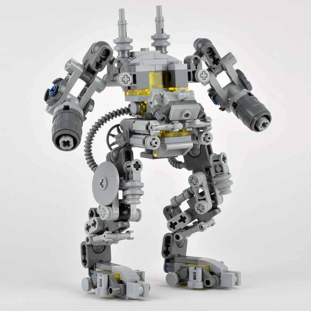 A toy robot figure, styled like a mech