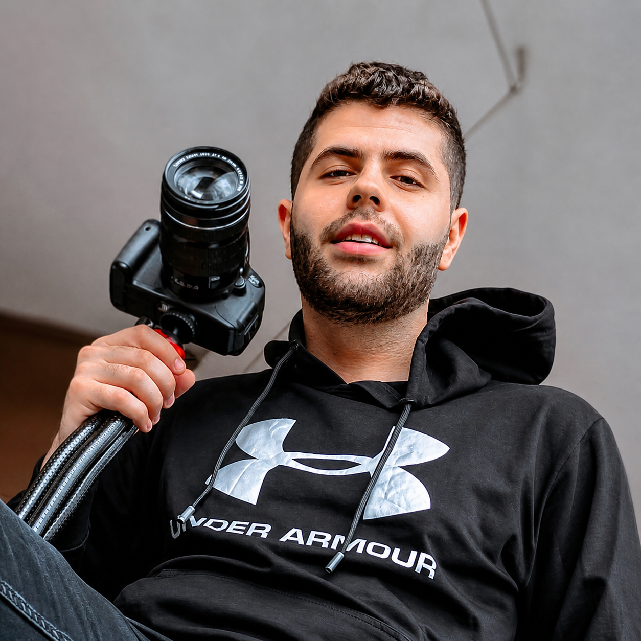 Content creator holding a camera